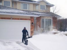 snow-driveway-clearing-residential-neighborhood